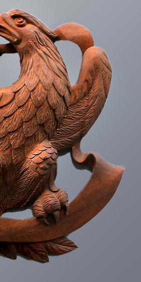 right side of Gunsmith Eagle hand carved with wood