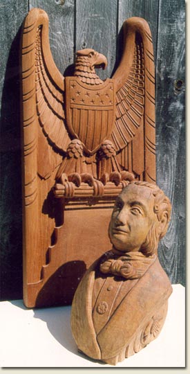 image of woodcarved figure and wood handcarved eagle