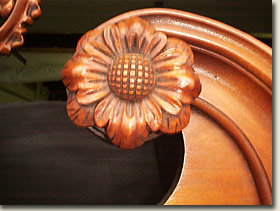 image showing handcarved detail on top of highboy