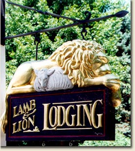 picture of lion and lamb sign in front of lodging